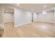Open basement area with recessed lighting, neutral walls and flooring ready for customization and living space at 50 Yarrow St, Lakewood, CO 80226