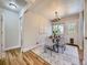 Dining room featuring modern furnishings, a stylish rug and natural light at 50 Yarrow St, Lakewood, CO 80226
