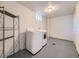 Functional laundry room with modern appliances, ample space, and a convenient layout at 50 Yarrow St, Lakewood, CO 80226