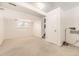 Finished basement offering a large living area and a window for natural light at 6348 S Independence St, Littleton, CO 80123