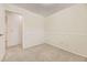 A bright bedroom with plush carpet and neutral paint, perfect for relaxation and rest at 6348 S Independence St, Littleton, CO 80123