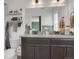 This bathroom features a double vanity and shower and tub combination at 4391 S Nepal St, Centennial, CO 80015