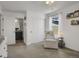 The bedroom has a chair, large closet, and a bathroom nearby at 4391 S Nepal St, Centennial, CO 80015