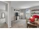 The living room features a large window, comfy couch, and stylish décor at 4391 S Nepal St, Centennial, CO 80015