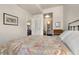 This spacious bedroom has unique decor, natural light, and a connected bathroom at 410 Acoma St # 314, Denver, CO 80204