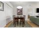 Inviting dining area with hardwood floors and stylish accents at 410 Acoma St # 314, Denver, CO 80204