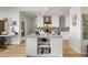 Well-lit kitchen with modern appliances and breakfast bar area at 410 Acoma St # 314, Denver, CO 80204