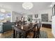 Open living room with hardwood floors and access to kitchen at 410 Acoma St # 314, Denver, CO 80204