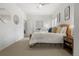 Bright main bedroom with neutral tones and a walk-in closet for ample storage at 410 Acoma St # 314, Denver, CO 80204