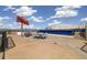 Rooftop deck showing furniture, an awning, and mountain views under a cloudy sky at 410 Acoma St # 314, Denver, CO 80204