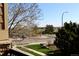 Balcony overlooking a well maintained community with grassy areas and sidewalks at 8726 S Kline St # A208, Littleton, CO 80127
