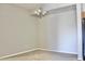 Neutral colored living room featuring modern chandelier and beige carpet at 8726 S Kline St # A208, Littleton, CO 80127