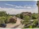 An elevated shot of the neighborhood showcasing the beautiful landscaping and charming architecture at 8726 S Kline St # A208, Littleton, CO 80127