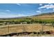 Scenic view of the lush landscape and mountains on a bright, sunny day at 8726 S Kline St # A208, Littleton, CO 80127