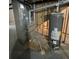 Basement utility area features a furnace and water heater at 894 S Krameria St, Denver, CO 80224