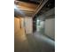 Spacious unfinished basement area offering ample storage and potential living space at 894 S Krameria St, Denver, CO 80224