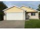 Charming single-Gathering home featuring a spacious two-car garage and well-maintained front yard at 894 S Krameria St, Denver, CO 80224