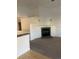 Bright living room with a fireplace and neutral-toned walls, creating a cozy atmosphere at 894 S Krameria St, Denver, CO 80224