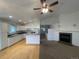 Spacious layout with a large kitchen overlooking the living room and fireplace at 894 S Krameria St, Denver, CO 80224