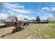 Spacious backyard with lush grass, playground, providing a perfect area for recreation and relaxation at 6779 W 79Th Cir, Arvada, CO 80003