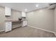 Functional basement area with desk and storage cabinets provides workspace and organization at 6779 W 79Th Cir, Arvada, CO 80003