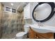 Bathroom featuring a window, walk-in shower and tile floor at 6779 W 79Th Cir, Arvada, CO 80003