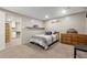 Cozy bedroom with neutral tones, comfortable bed, and ample storage space for a relaxing retreat at 6779 W 79Th Cir, Arvada, CO 80003