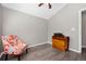 Inviting bedroom with bright accents, comfortable chair and storage space for a cozy retreat at 6779 W 79Th Cir, Arvada, CO 80003