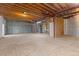 Unfinished basement offering potential for customization and ample storage space at 7713 S Zante Ct, Aurora, CO 80016