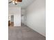 Spacious bedroom area showing neutral carpet, and multiple entrances and an ensuite bathroom at 7713 S Zante Ct, Aurora, CO 80016