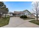 Charming single-Gathering home boasts a well-maintained lawn and inviting curb appeal at 7713 S Zante Ct, Aurora, CO 80016
