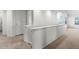 Second floor hallway with natural light, featuring neutral walls and carpeted floor at 7713 S Zante Ct, Aurora, CO 80016
