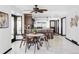 Charming dining area with a round table, seating for four, and views of the kitchen at 10690 County Road One, Longmont, CO 80504