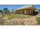 Exterior of a block horse barn with multiple stalls and a well-maintained fenced area at 10690 County Road One, Longmont, CO 80504