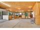 Spacious horse barn interior with stalls and concrete floor at 10690 County Road One, Longmont, CO 80504