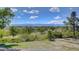 Scenic view of the landscape with a mountain range in the background on a sunny day at 10690 County Road One, Longmont, CO 80504