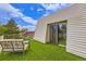 Sunny balcony with artificial turf and comfortable seating, overlooking a beautiful view at 3378 Mowry Pl, Westminster, CO 80031