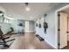 Spacious finished basement area with recessed lighting, exercise area, and hardwood floors at 3378 Mowry Pl, Westminster, CO 80031