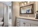 Cozy bathroom with neutral walls, a bathtub shower, and a vanity featuring great lighting and modern fixtures at 3378 Mowry Pl, Westminster, CO 80031