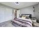 Serene bedroom with a plush bed, soft carpet, and a closet at 3378 Mowry Pl, Westminster, CO 80031