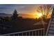 Spectacular sunset view features a radiant sky over the majestic mountains, showing the beauty of the evening landscape at 3378 Mowry Pl, Westminster, CO 80031