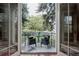 Balcony with outdoor seating and lush green view at 1260 Hudson St, Denver, CO 80220
