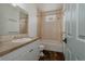 Tiled bathroom featuring modern fixtures, vanity storage, and a shower-tub combination at 1260 Hudson St, Denver, CO 80220
