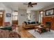 Inviting living room features a fireplace, hardwood floors, and comfortable seating arrangement at 1260 Hudson St, Denver, CO 80220