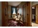 Cozy home office with wooden floors and large windows at 1260 Hudson St, Denver, CO 80220