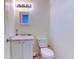 Cozy bathroom with a single sink vanity and a toilet at 5241 E 128Th Way, Thornton, CO 80241