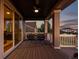 Covered back deck with ceiling fan, outdoor seating, and a beautiful view at 696 Eveningsong Dr, Castle Rock, CO 80104