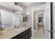 Bathroom featuring vanity with mirror, sink, and views into the bedroom at 696 Eveningsong Dr, Castle Rock, CO 80104