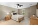 Bedroom with natural light, bed, and side table at 696 Eveningsong Dr, Castle Rock, CO 80104
