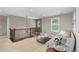 Comfortable loft seating area with hardwood railing at 696 Eveningsong Dr, Castle Rock, CO 80104